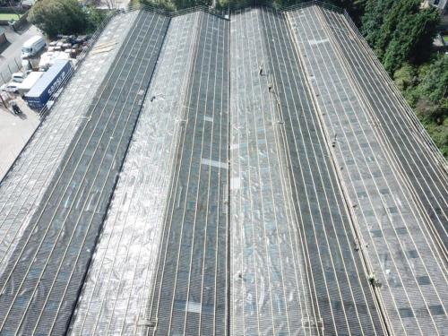 Preparing an asbestos roof overlay